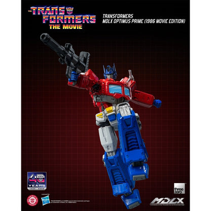 Transformers Optimus Prime 1986 Movie Edition MDLX Action Figure — airborne pose with raised blaster