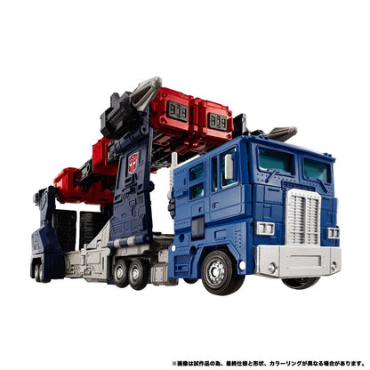 Transformers NL-08 Delta Magnus Primal Vanguard Set — low front three-quarter view of carrier trailer mode