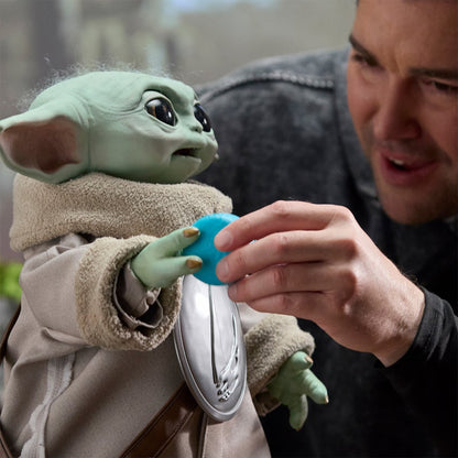 Star Wars Ultimate Grogu 1:1 Scale Premium Animatronic Replica — interaction with blue accessory